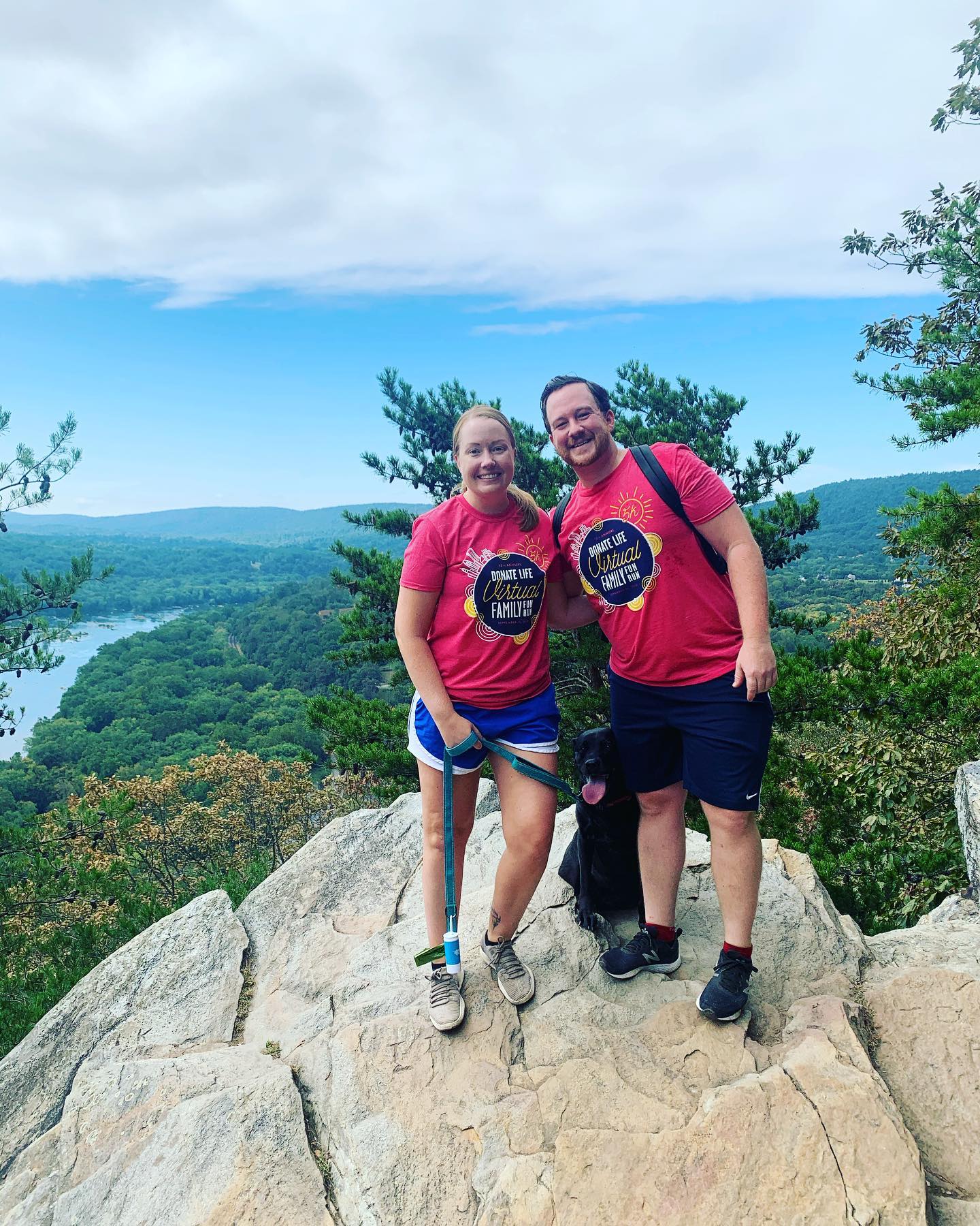 Two individuals wear a Donate Life Virtual Family Fun Run t shirt to honor organ, eye and tissue donors in Maryland, Northern Virginia and Washington, DC.