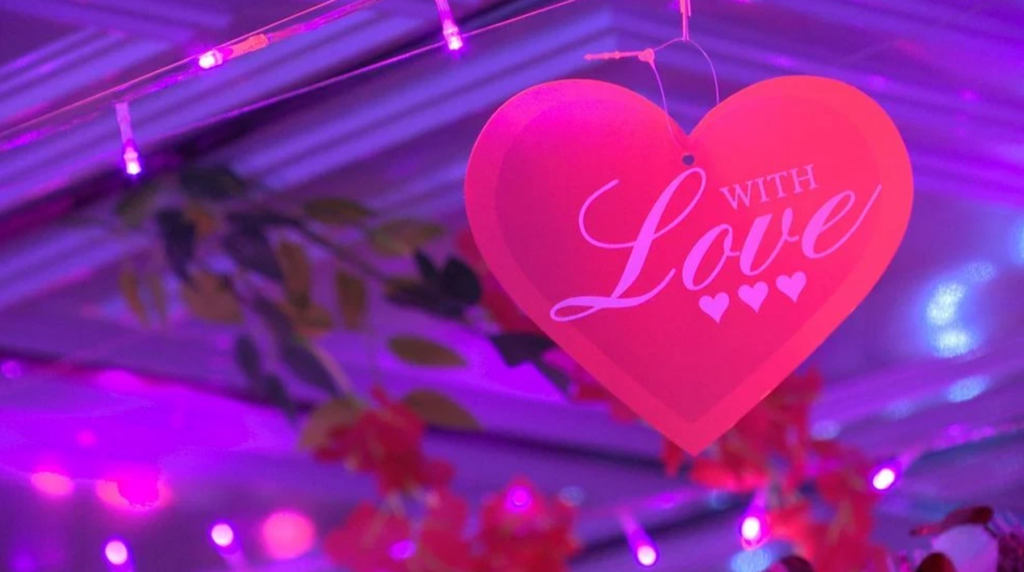 A heart decoration including the words "With Love."