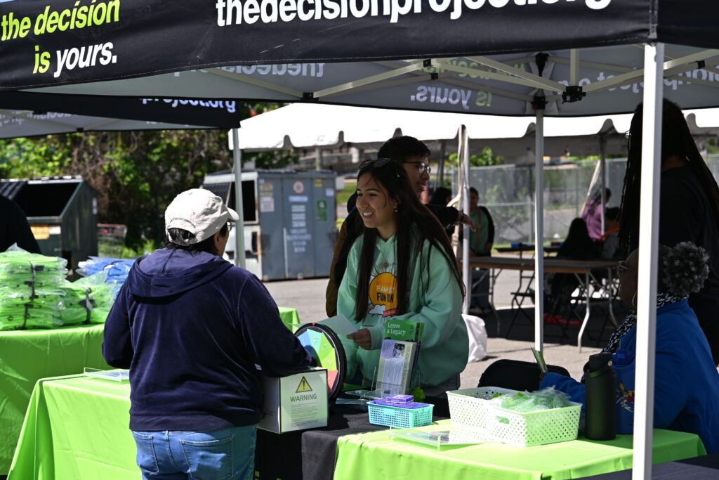 The Decision Project hands out backpacks at Infinite Legacy's Block Party to raise awareness about organ, eye and tissue donation.