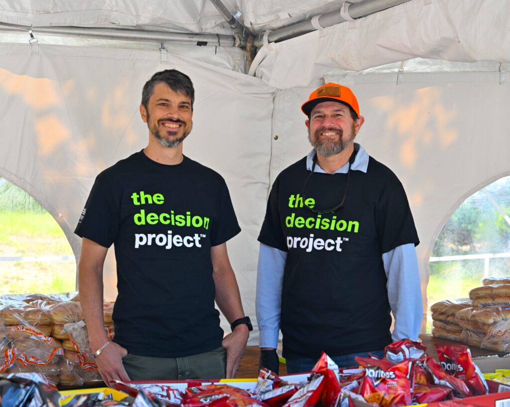 Volunteers wear The Decision Project t-shirts at an Infinite Legacy Block Party to raise awareness about organ, eye and tissue donation.
