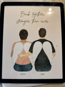 Drawing of Leigh and Sam with angel wings and the saying "back together, stronger than ever."